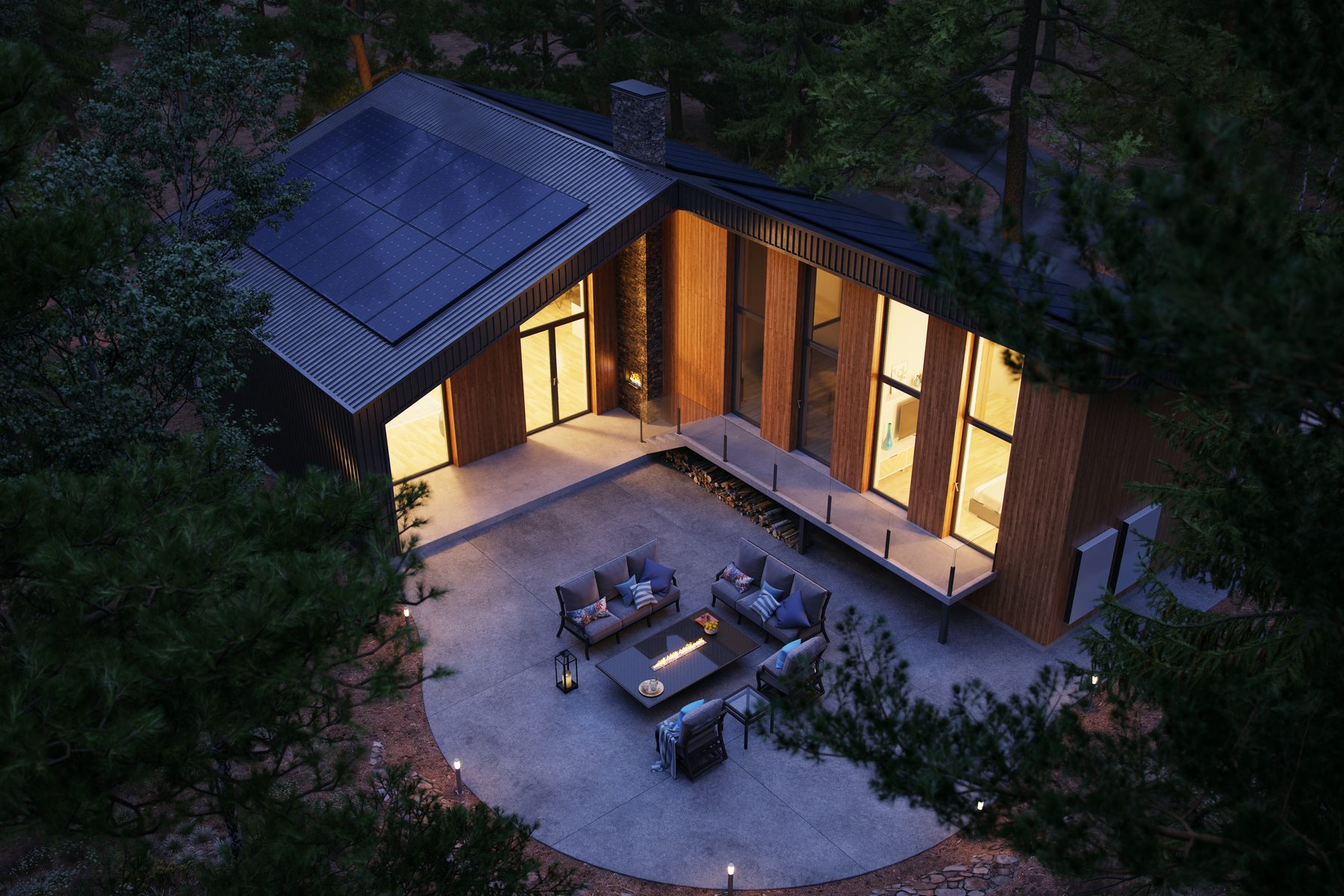 Modern home with rooftop solar panels and battery storage, illuminated at dusk